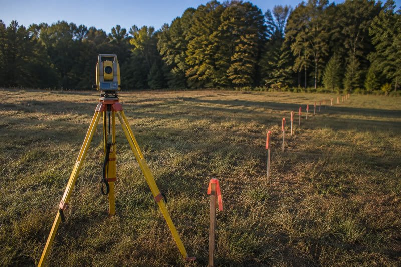 Land survey cost — Boundary surveys, plats, and when a lender demands one.